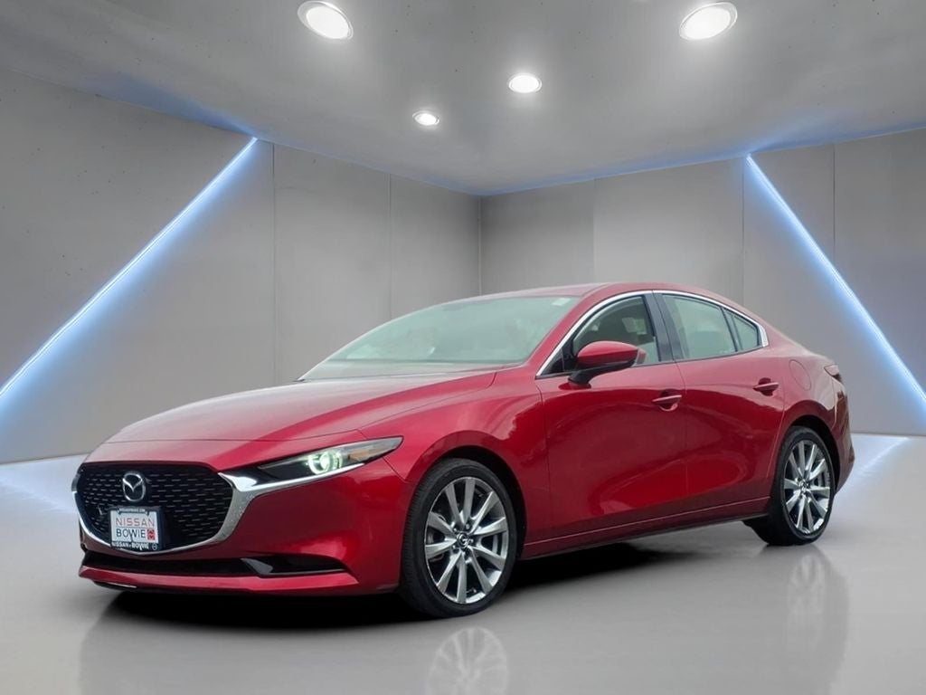 2021 Mazda Mazda3 Premium in Soul Red Crystal Metallic — front three-quarter view