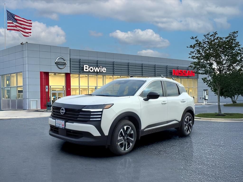 2026 Nissan Kicks SV in Aspen White Tricoat — front three-quarter view
