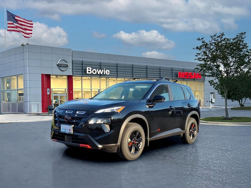 2026 Nissan Rogue Rock Creek in Super Black — front three-quarter view