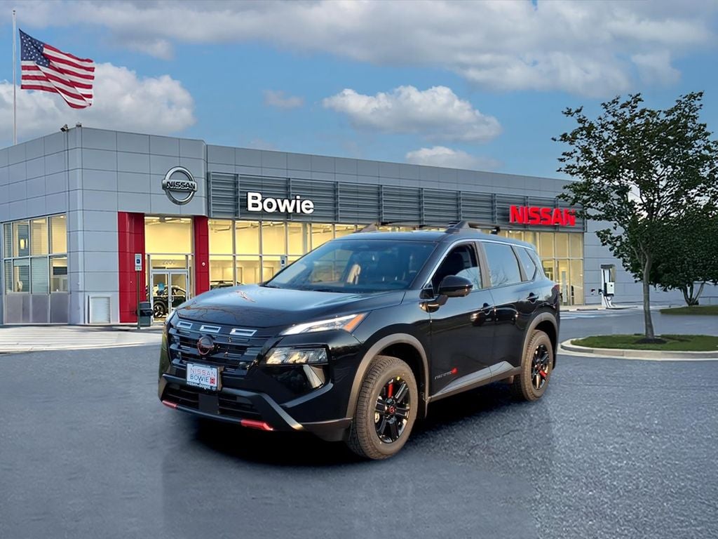 2026 Nissan Rogue Rock Creek in Super Black — front three-quarter view