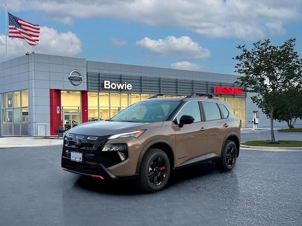 2026 Nissan Rogue Rock Creek in Baja Storm Metallic — front three-quarter view