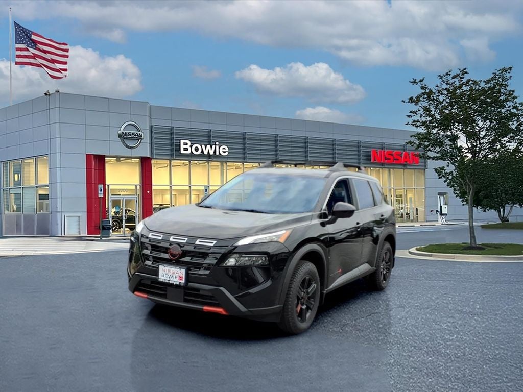 2026 Nissan Rogue Rock Creek in Super Black — front three-quarter view