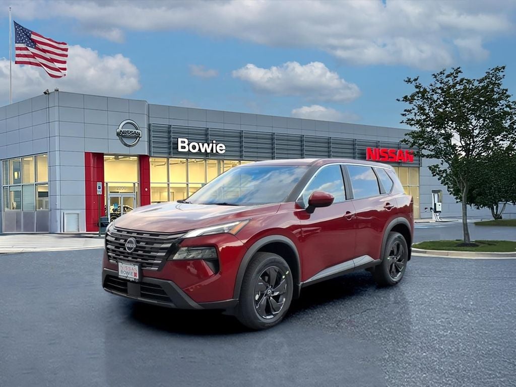 2026 Nissan Rogue SV in Scarlet Ember Tintcoat — front three-quarter view