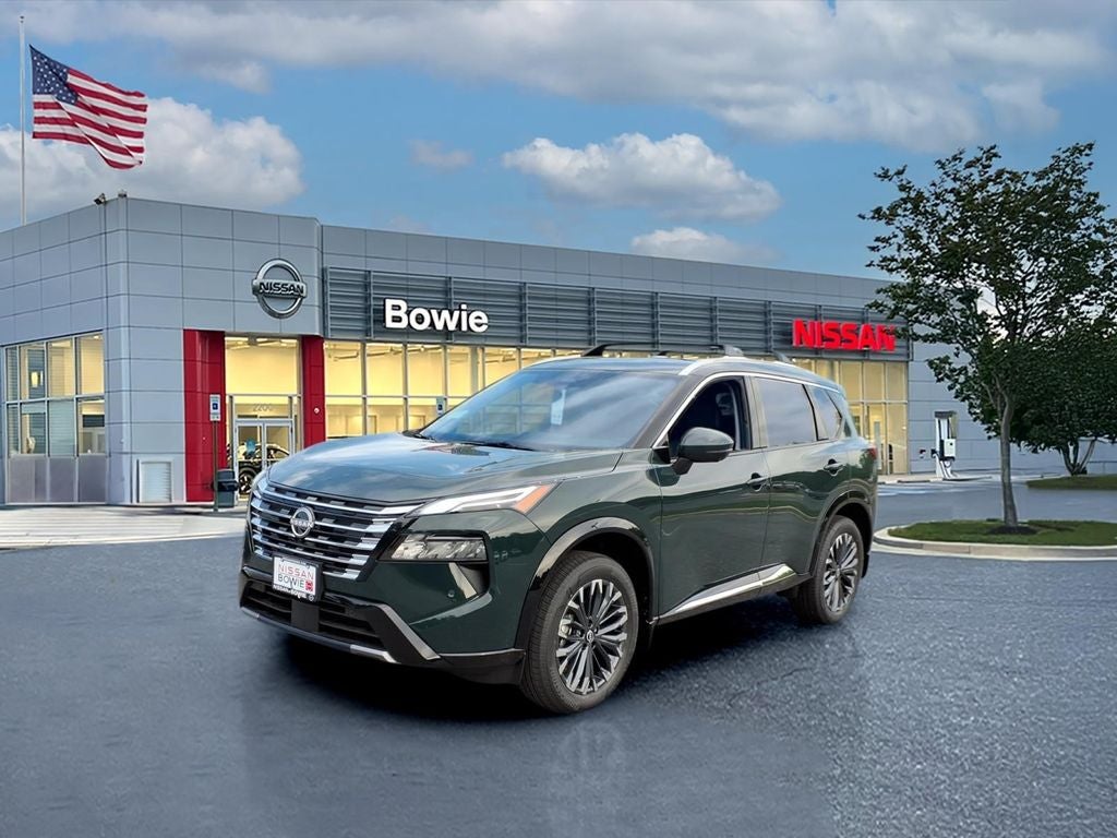 2026 Nissan Rogue Platinum in Obsidian Green — front three-quarter view