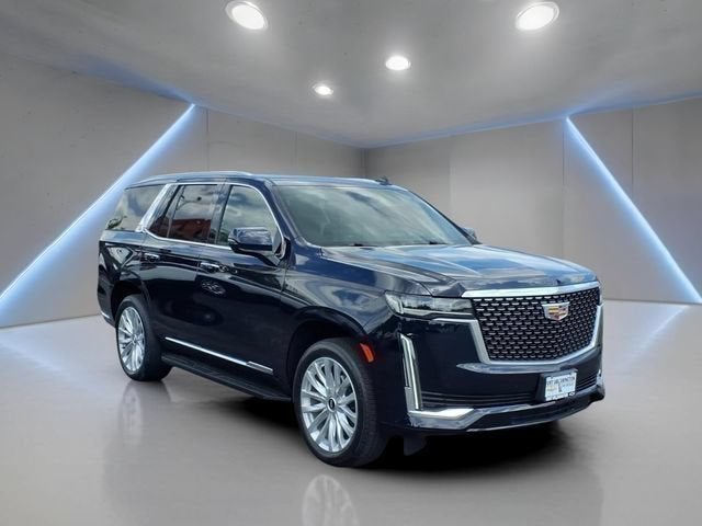 2023 Cadillac Escalade Luxury in Dark Moon Blue Metallic — front three-quarter view