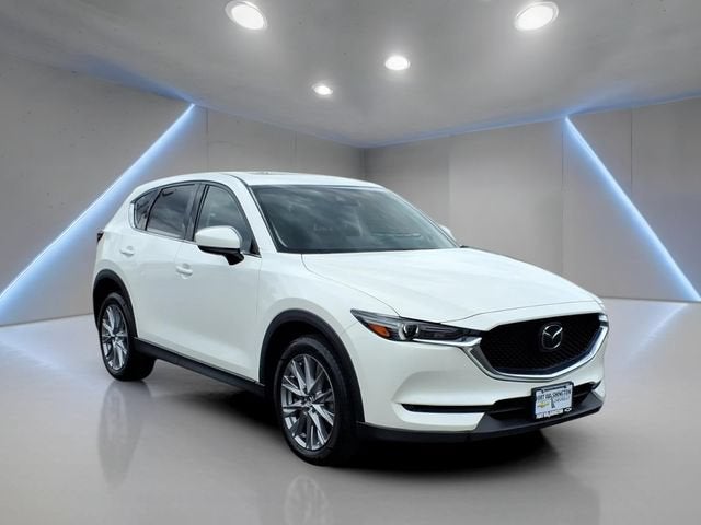 2021 Mazda Mazda CX-5 Grand Touring in White — front three-quarter view