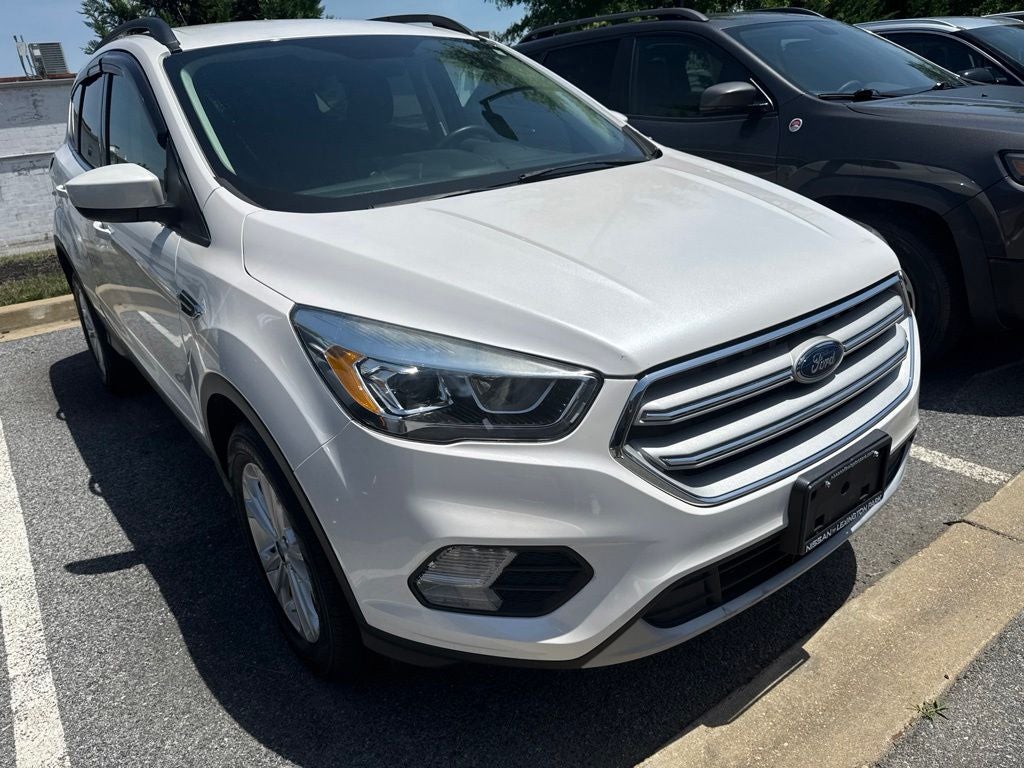 2019 Ford Escape SEL in White Platinum Clearcoat Metallic — front three-quarter view