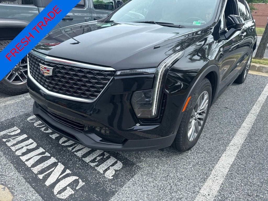 2025 Cadillac XT4 Premium Luxury in Stellar Black Metallic — front three-quarter view